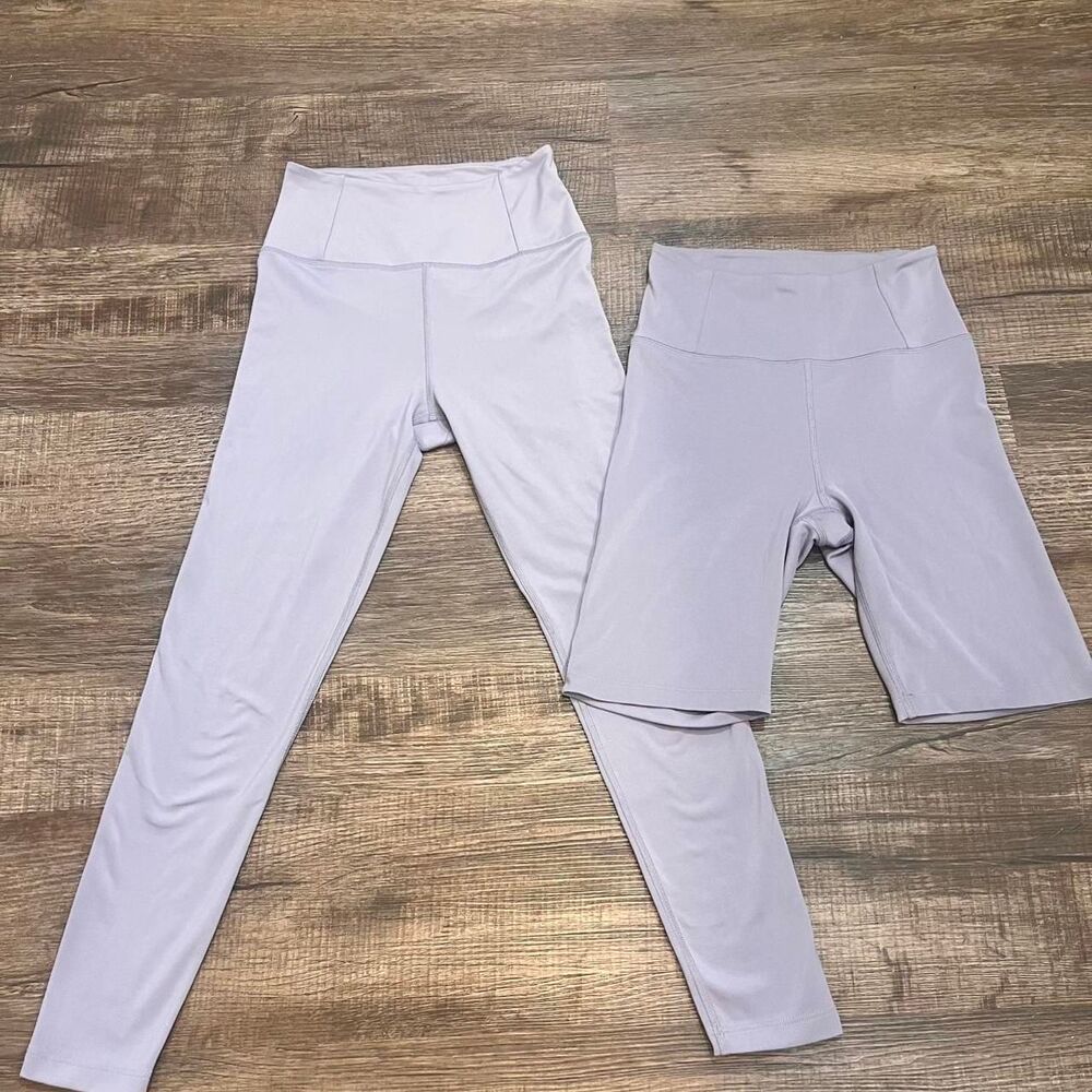 Girlfriend Collective light blue lavender purple leggings and bike shorts set